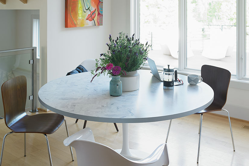 Table with plant and computer 9310 white marble herringbone formica infiniti