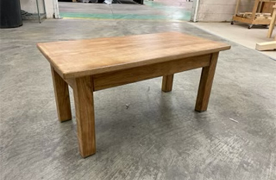 Finished table constructed from scrap wood