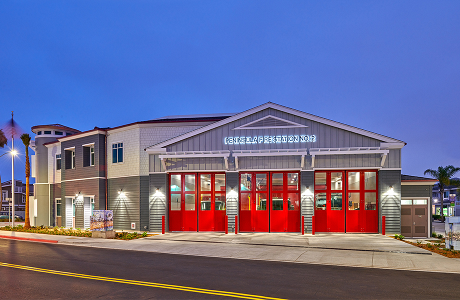 Fire station exterior with three garage doors
