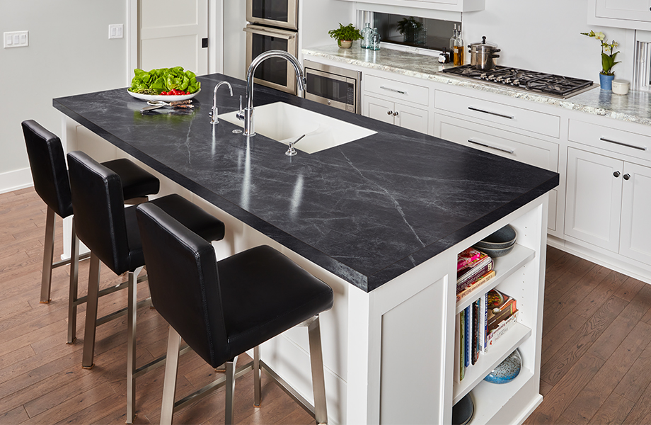 Black and white kitchen with 3476 Jet Sequoia island and 9284 Classic Crystal Granite countertops
