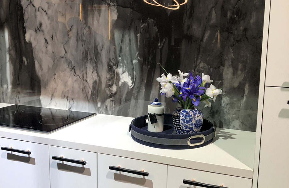 Flush doors and thinner surfaces in kitchens and baths were seen at ProCraft, KBIS 2019
