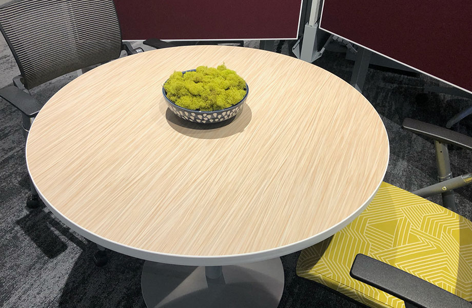 AIS showcased this gorgeous table featuring Wheat Strand laminate by Formica Group.