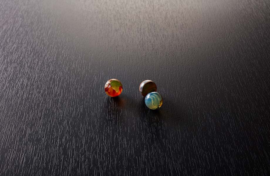 Marbles on black Formica laminate with NT Naturelle texture