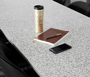 412 Dalmata Terrazzo Matrix study table with notebook and coffee