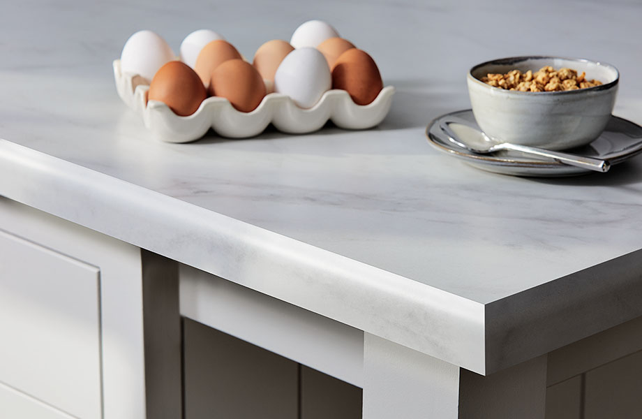 Calacatta Cava 180fx® Laminate kitchen countertop with eggs and cereal