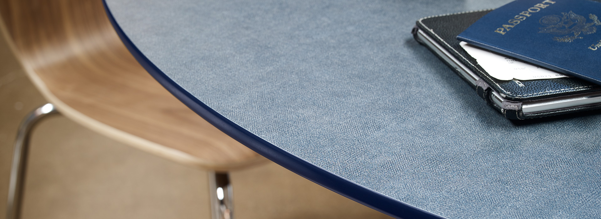Table top with coffee and passport 9448 Infinity Duotex ColorCore2 Compact