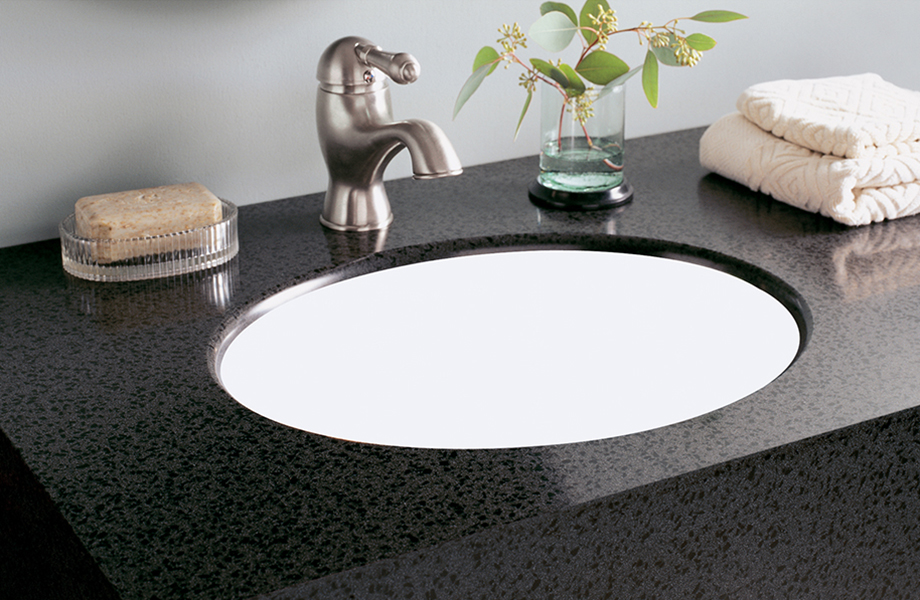 Bathroom sink with soap and plant L075 501 Black Lava Formica Solid Surfacing