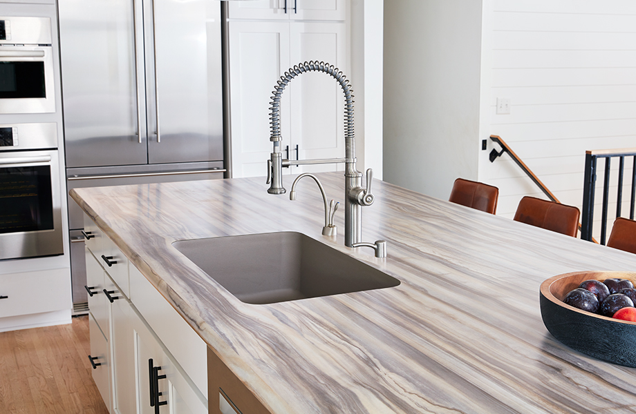 Modern kitchen with Formica laminate island and undermount sink