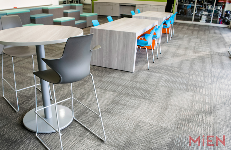 School common area with variety of tables in Fox Teakwood Formica Laminate