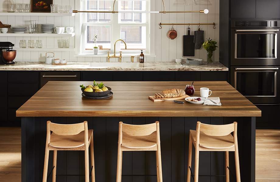 Wide Planked Walnut kitchen island countertops with snacks and River Gold kitchen countertops