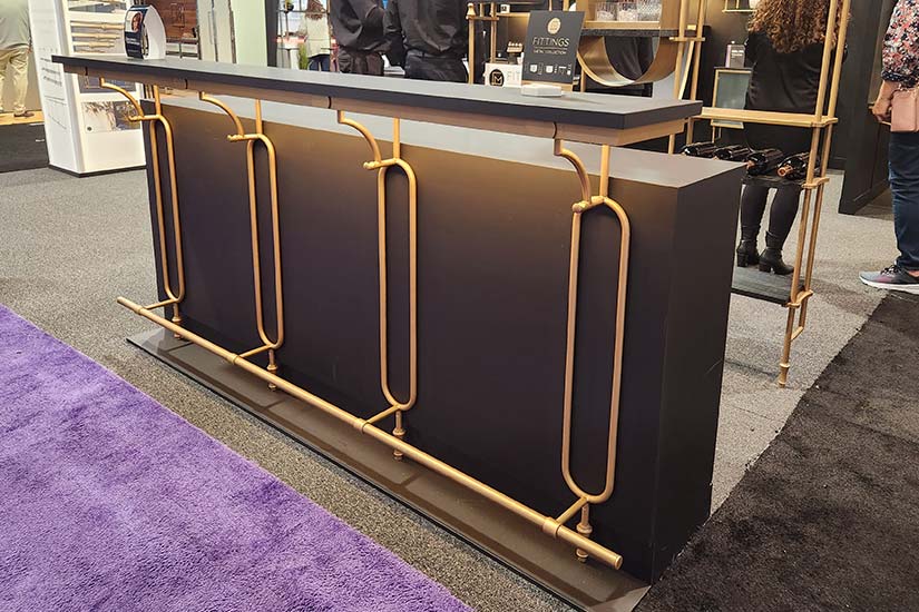 Freestanding black bar with gold detailing