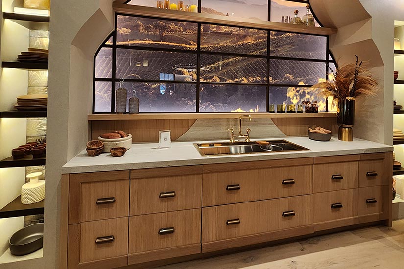 Kitchen with wood cabinets and large window