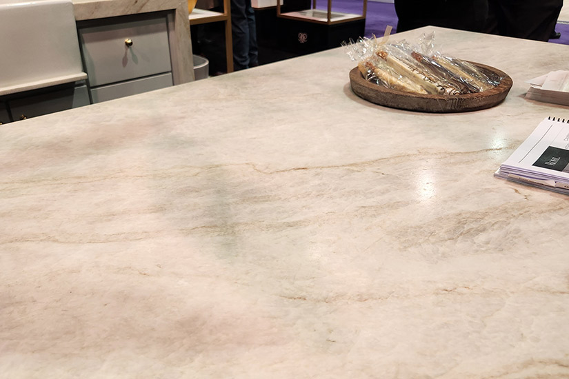 Large kitchen island with marble countertop