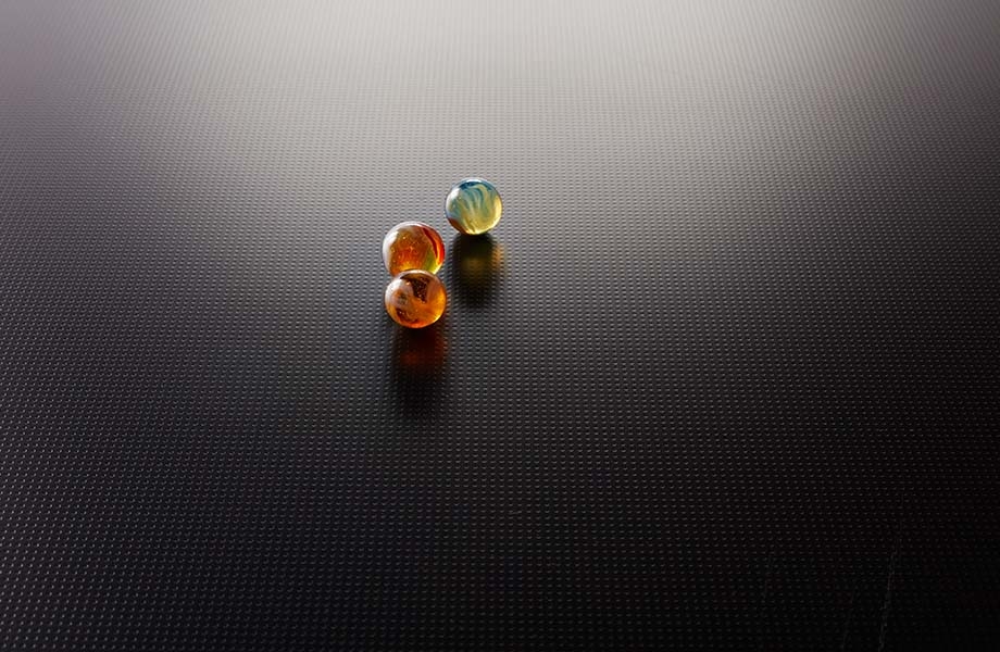 Marbles on black Formica laminate with MC Microdot texture