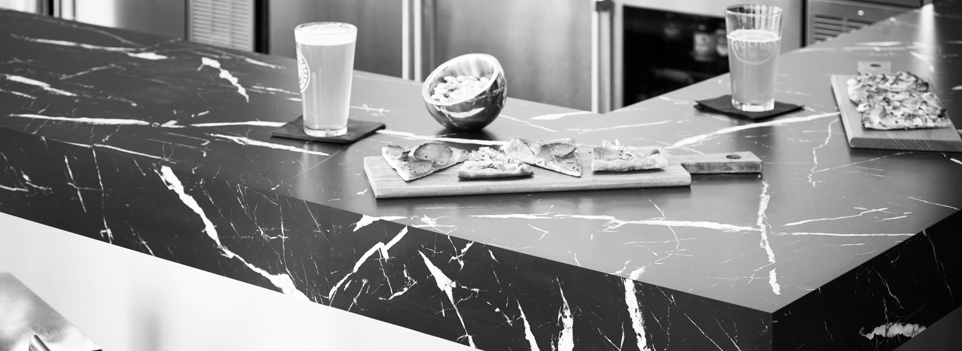 Bar 180fx® Laminate by Formica Group 7403-11 Nero Marquina, DecoMetal® metal laminate M2042 Brasstoned Brushed Aluminum