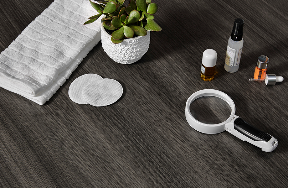 Formica countertop close up with makeup and accessories