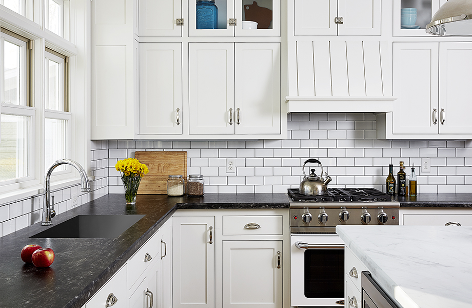 Minimalist Black Kitchen Cabinets With White Marble Countertops 