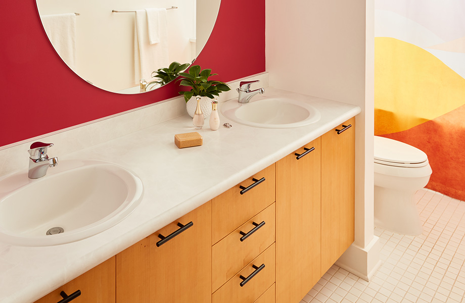 Bright bathroom with two sinks and White Alabaster 180fx® Laminate counters