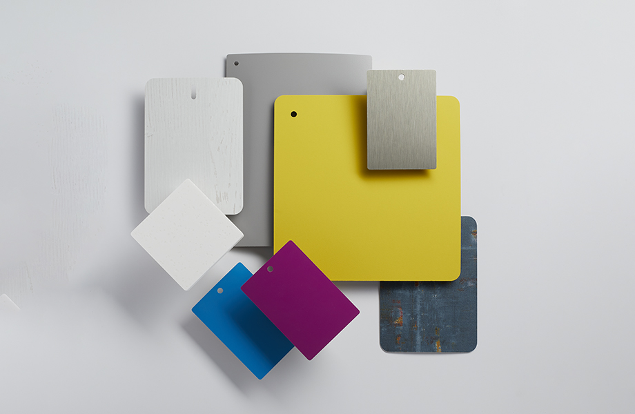 Collection of Formica laminate samples in white, gray and bright colors 
