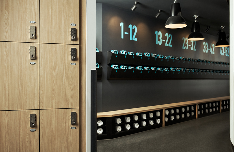 Flywheel locker room with Aged Ash Formica Laminate lockers
