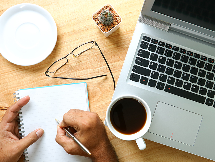 Continuing education CEU with laptop notebook coffee glasses
