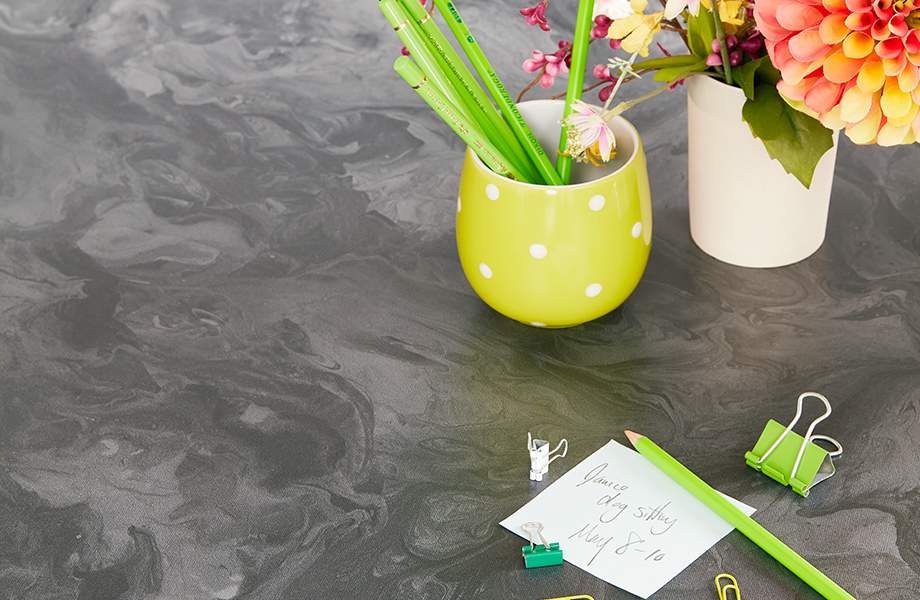 Close-up of Marbled Gray Formica laminate desk with plants