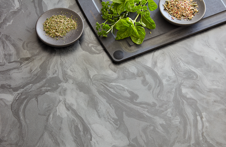 Close-up of Marbled Gray Formica laminate countertop with spices and herbs