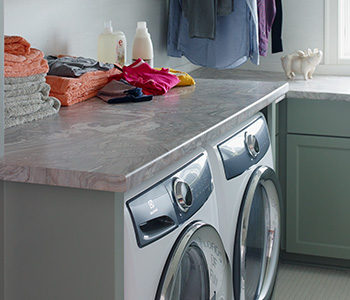 Laundry room with folded towels 7404 Neapolitan Stone 180fx