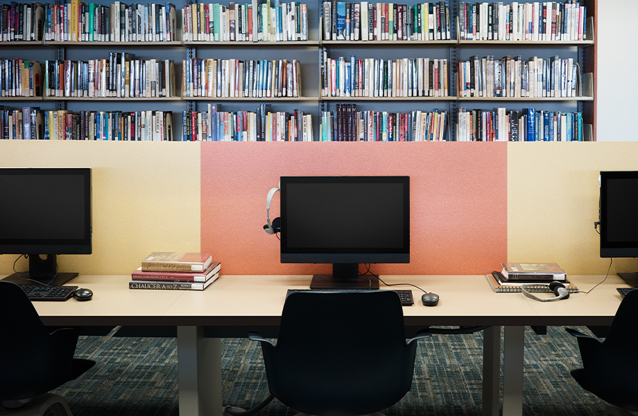 School library with computers on 9684-58 Natural Recycled Kraft table with 4972-PA Yellow Felt 4973-PA and Orange Felt partitions