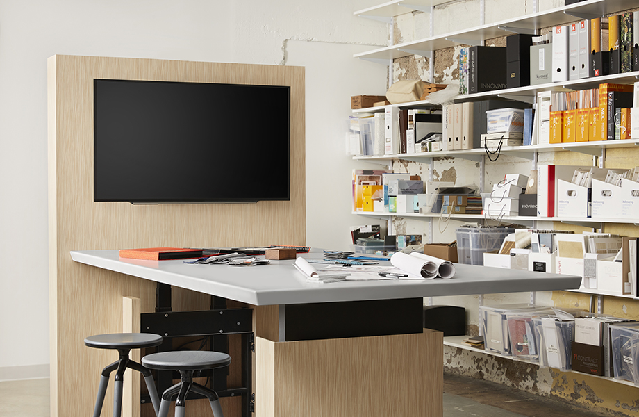 Office workspace with 6212-58 Wheat Strand panels, monitor and 417 Gamma Gray solid surface countertop