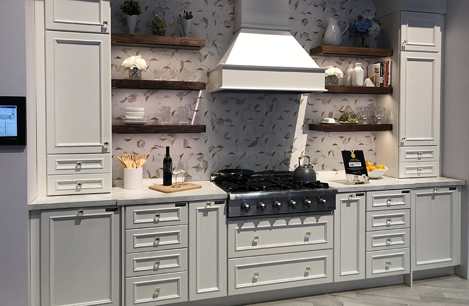 Fabuwood kitchen with white cabinetry, range and Formica® Laminate countertops in Gray Onyx