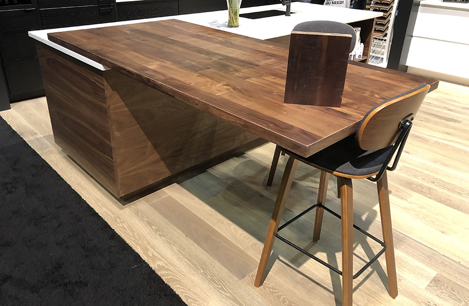 Hallmark Hardwoods kitchen with walnut countertop and chair