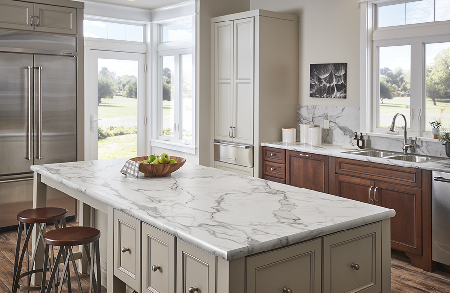 Light and bright kitchen with 3460 Calacatta Marble island and IdealEdge Double Radius 