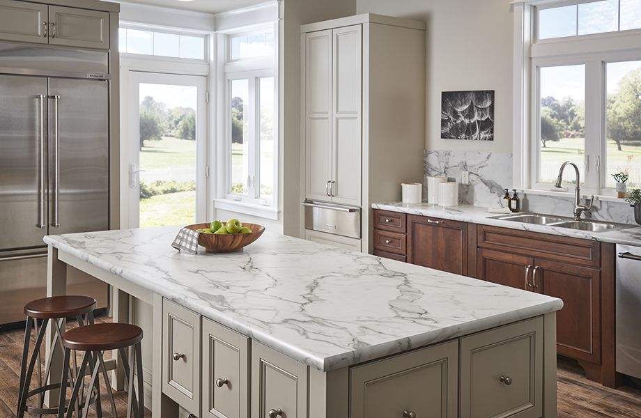 Light and bright kitchen with 3460 Calacatta Marble island and IdealEdge Double Radius