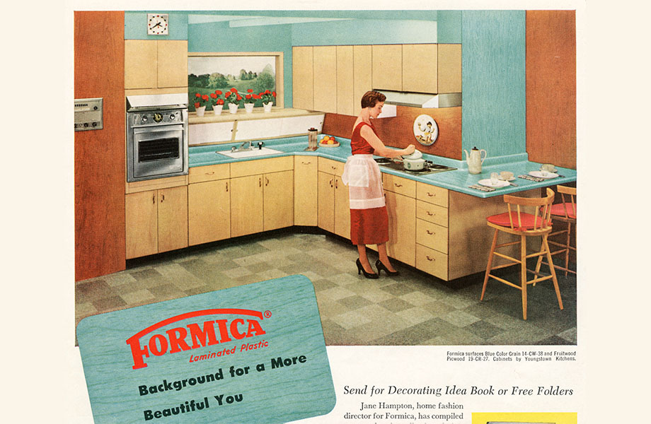 Vintage kitchen ad with woman at stove, light blue Formica laminate countertops, and woodgrain cabinets