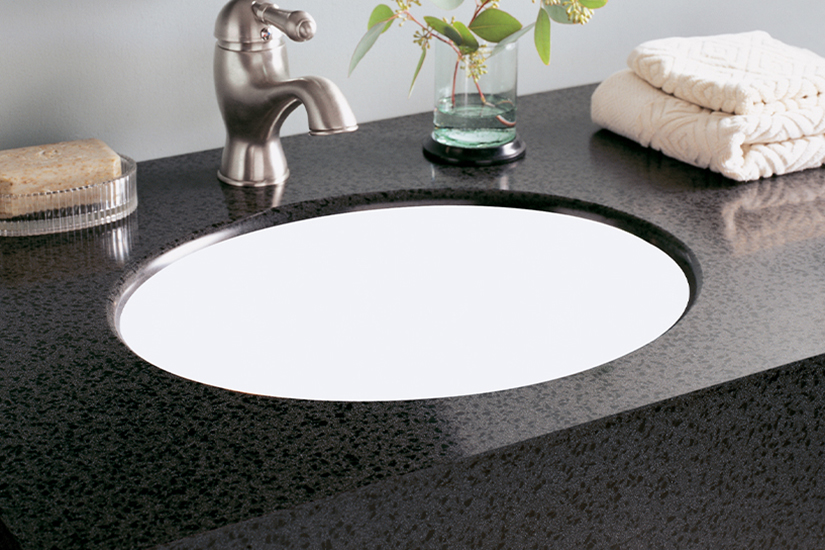 Bathroom sink with soap and plant L075 501 Black Lava Formica Solid Surfacing