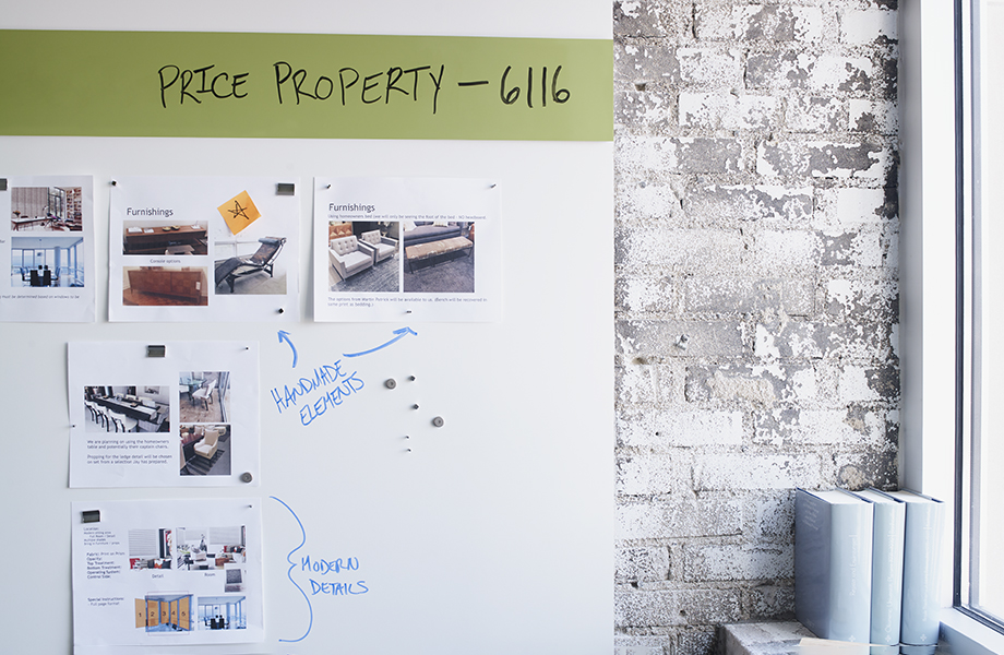 Office setting with M8207 Projection White magnetic markerboard with paperwork