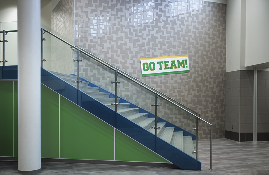 Stairway in educational setting with Algae HardStop wall protection panels