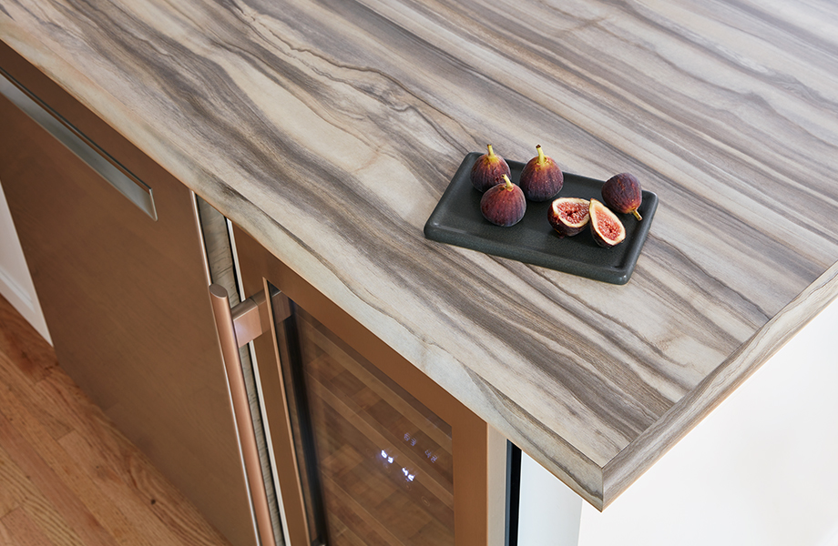 Formica laminate kitchen island with wine fridge and figs