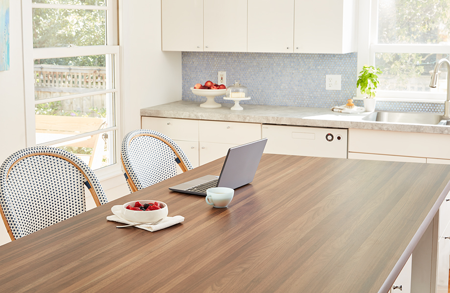 Modern kitchen with Formica butcherblock laminate island and countertops 