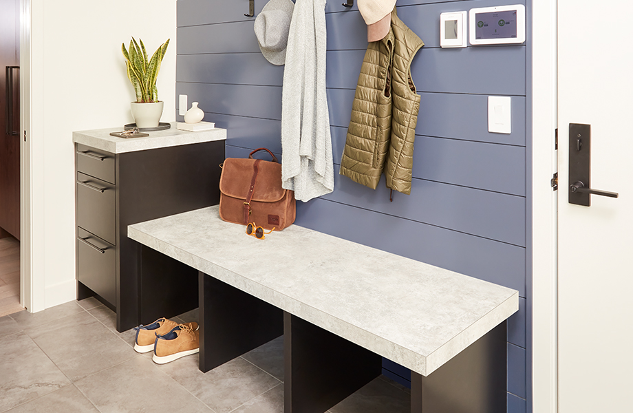 Mudroom with coats, shoes and Formica laminate bench