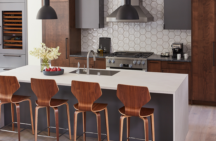 Kitchen with Formica laminate island and bar stools