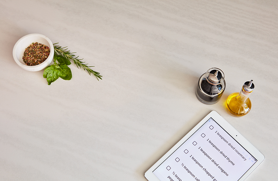 Formica laminate table top with recipe and olive oil