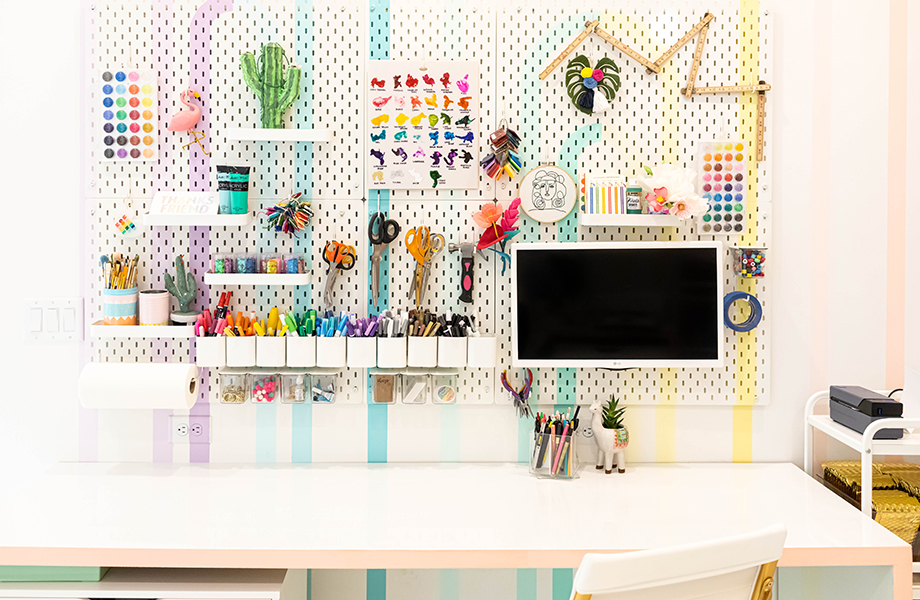 Craft room desk with laminate surface and supplies
