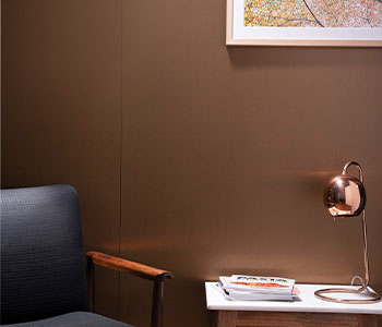 M9410 Brushed Coin lobby wall with chair and side table