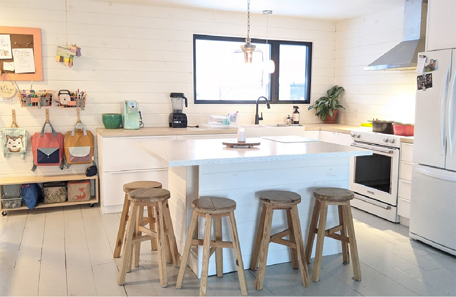 White Kitchen with solid surface countertop