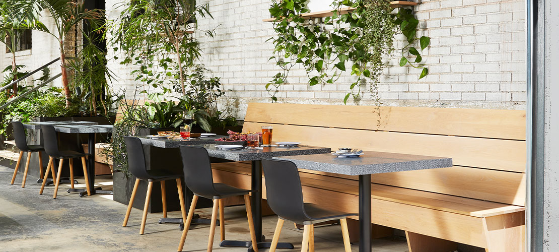 411 Grafite Terrazzo Matrix Restaurant dining tables with food and drinks