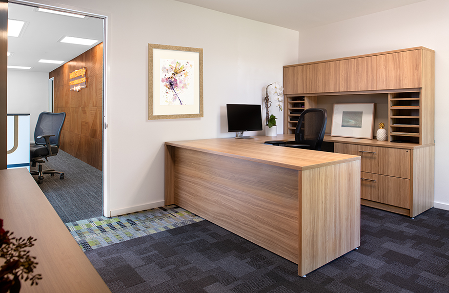 Office with a large woodgrain laminate desk