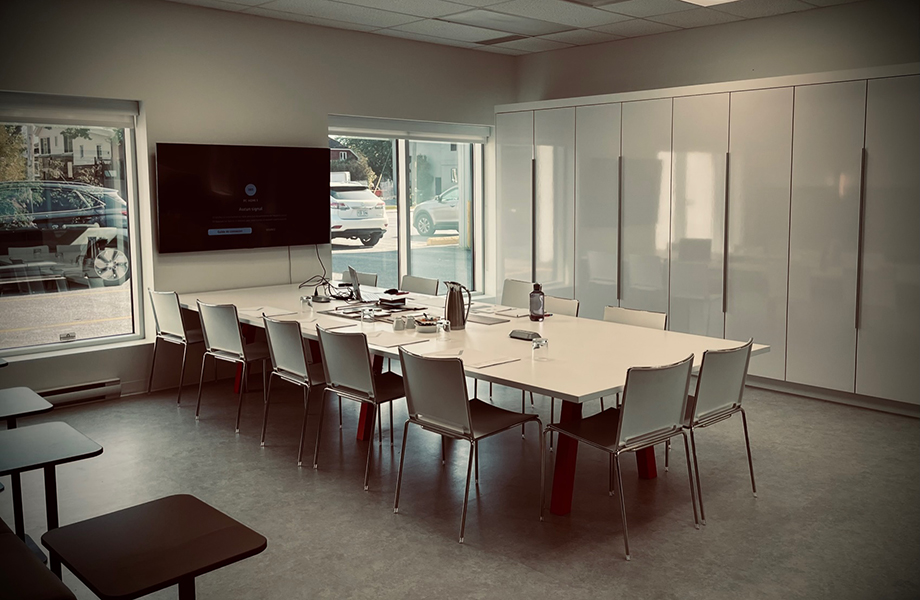 An office meeting and break room with markerboard cabinets