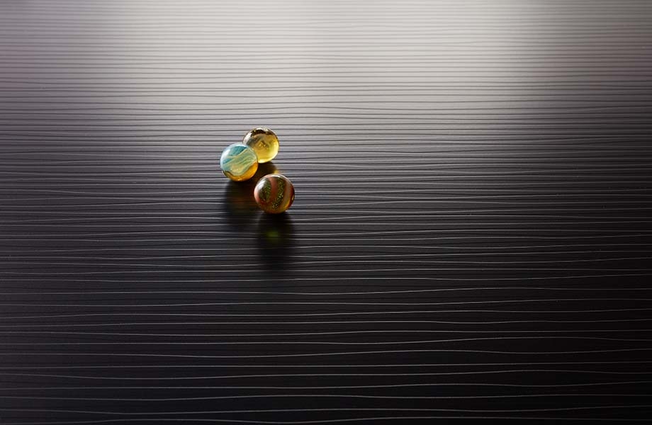 Marbles on black Formica laminate with SP Sculpted texture